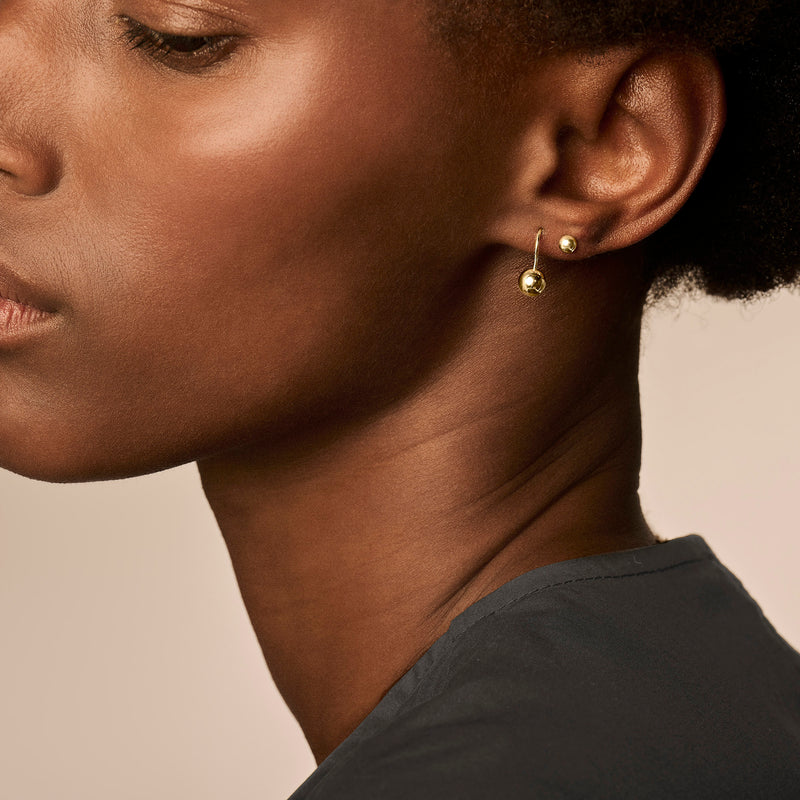 Knopjes oorbellen ⌀ 4 mm 14k Geel goud